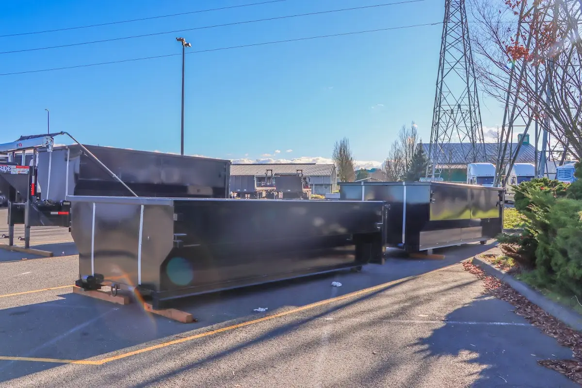 Roll-off dumpster ready for waste disposal at job site for Roofing Dumpster Rental in Morehead City